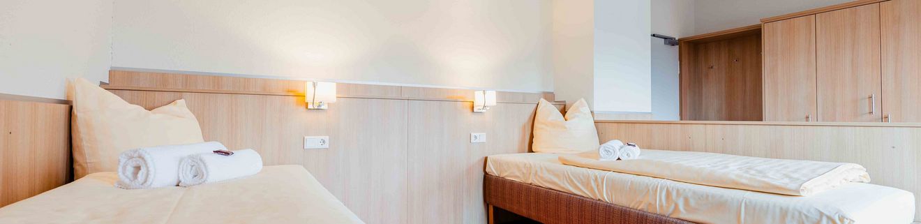 Zweibett-Gästezimmer
